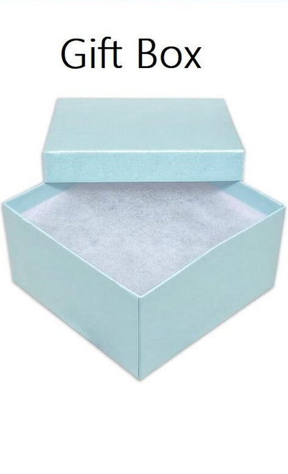 May include: A light blue gift box with a white interior lining. The box is open and the lid is resting on top.