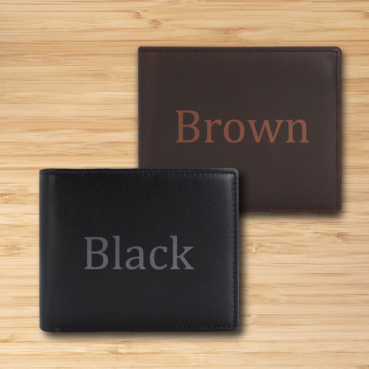 May include: Two leather wallets, one black and one brown, with the words "Black" and "Brown" embossed on them.