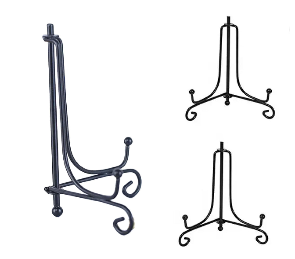 May include: Three black metal display stands with a decorative scroll design. The stands are designed to hold plates, photos, or other items.