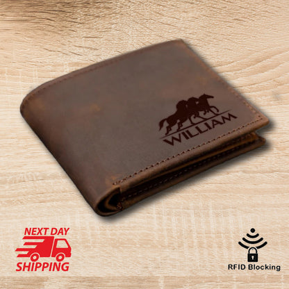 May include: A brown leather wallet with a personalized design featuring two horses running and the name "WILLIAM" engraved on the front. The wallet has RFID blocking technology.