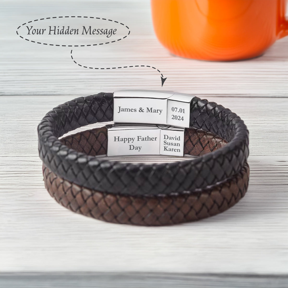 May include: Two-toned leather bracelet with a braided design. The bracelet has two silver metal plates with engraved text: "James & Mary 07.01.2024" and "Happy Father Day David Susan Karen".