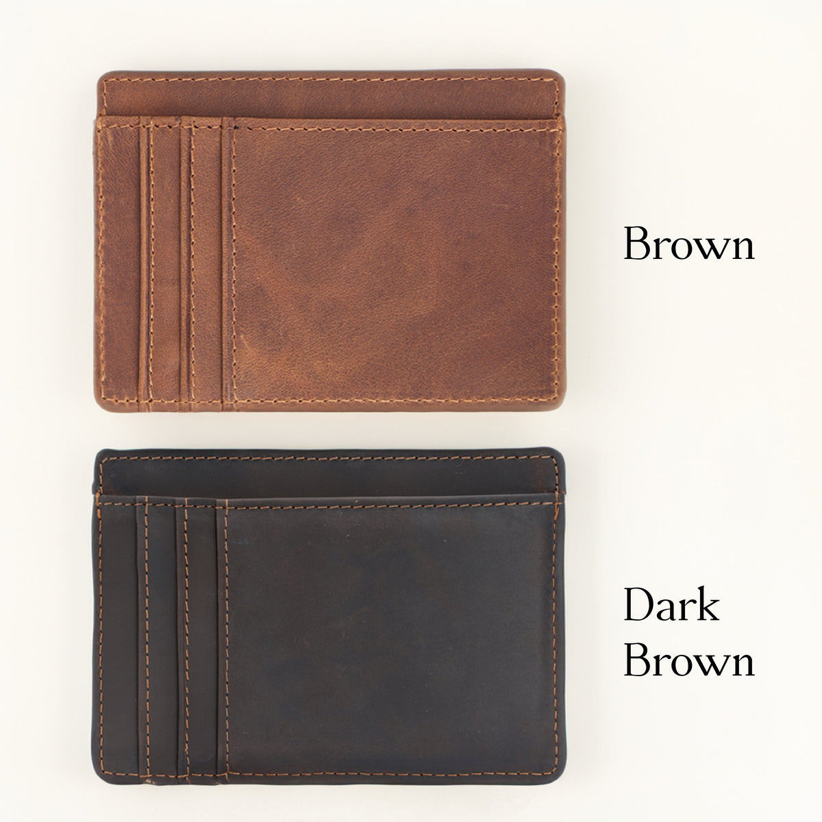 May include: Two leather card holders, one brown and one dark brown. Both have multiple card slots and are made of a smooth, textured leather.