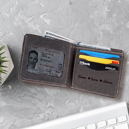May include: A brown leather wallet with a window for an ID card. The wallet has a personalized inscription that reads "Donna ♥ Kevin ♥ Sharon".