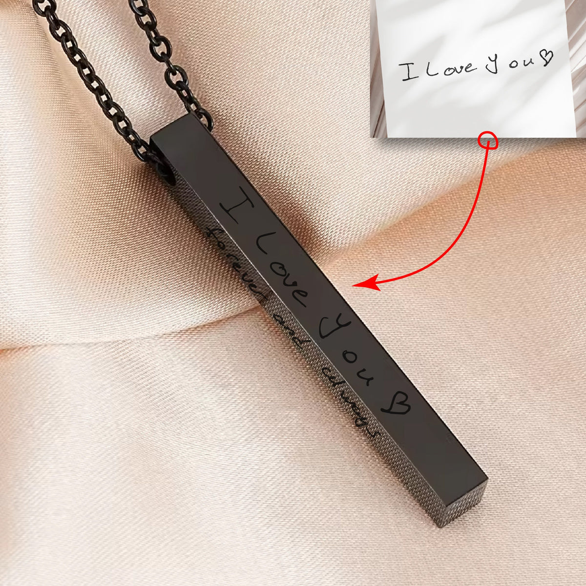 May include: A black necklace with a vertical bar pendant engraved with the handwritten message "I love you forever and always".