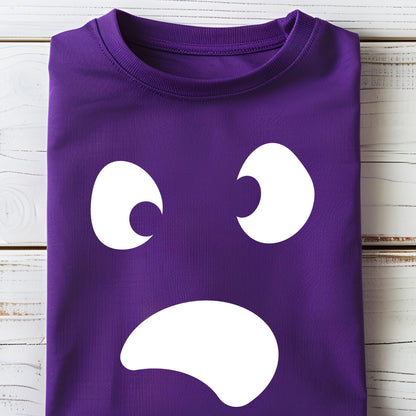 May include: A folded purple t-shirt featuring a white cartoon face design. The design includes two crescent-shaped eyes and a curved mouth, creating a sad expression. The shirt is made of a soft material.