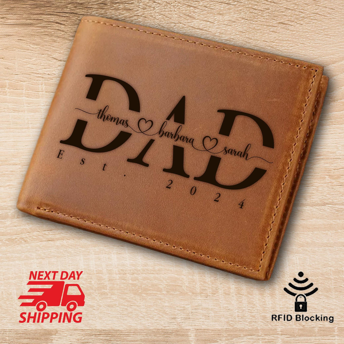 May include: Brown leather wallet with the word "DAD" engraved in black lettering. The names "thomas", "barbara", and "sarah" are engraved below the word "DAD" with hearts between each name. The date "2024" is engraved below the names.