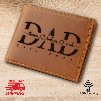 May include: Brown leather wallet with the word "DAD" engraved in black lettering. The names "thomas", "barbara", and "sarah" are engraved below the word "DAD" with hearts between each name. The date "2024" is engraved below the names.