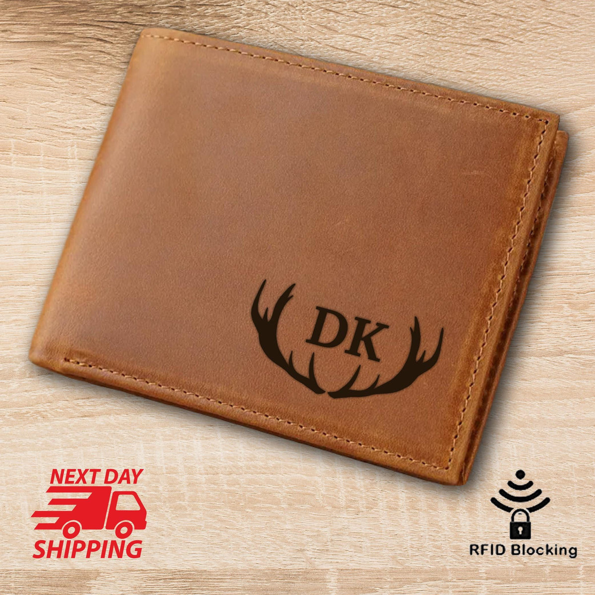 May include: A brown leather wallet with the initials "DK" and a deer antler design. The wallet has a stitched border and a textured appearance. The image also includes a "Next Day Shipping" graphic and an "RFID Blocking" icon.