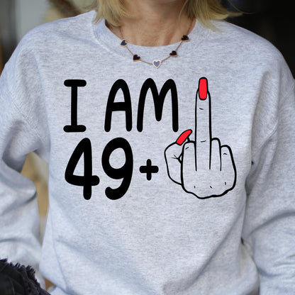 May include: Gray sweatshirt with the text "I AM 49+" and a cartoon hand giving the middle finger.