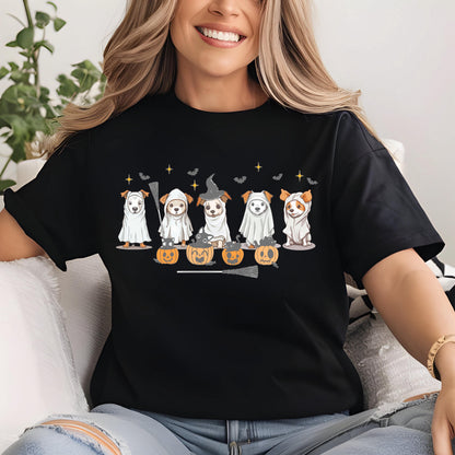 May include: A black t-shirt featuring a graphic print of five dogs dressed in white ghost costumes. The dogs are positioned around four orange jack-o'-lanterns with small black cats on them. The design includes small yellow stars and black bats.