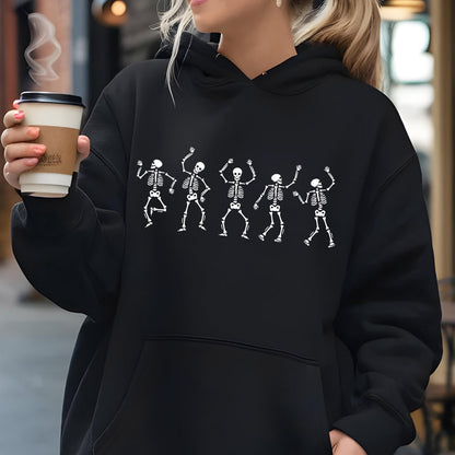May include: Black hoodie featuring a white graphic of dancing skeletons. The skeletons are depicted in a playful pose with their arms raised. The hoodie has a drawstring hood and a kangaroo pocket.