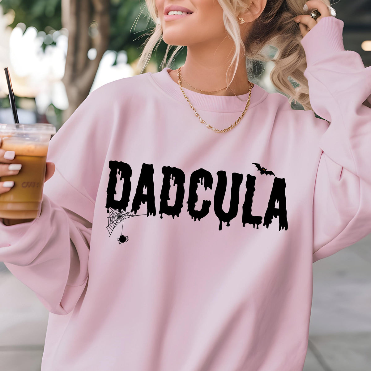 May include: Pink sweatshirt with a black graphic that says "DADCULA" with a spider and web design and a bat.