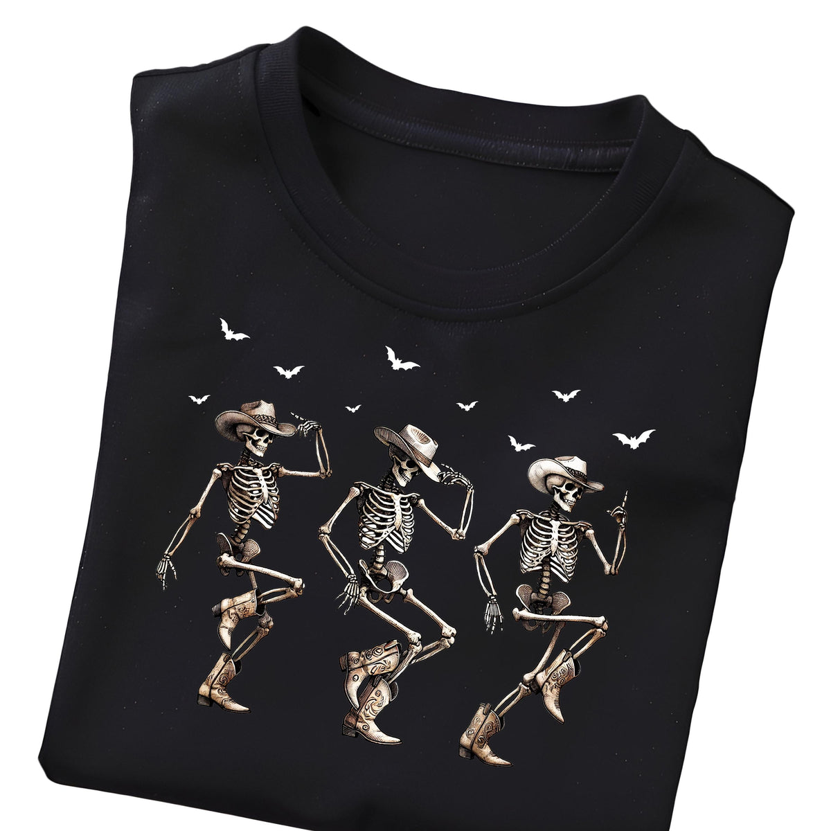 May include: Black t-shirt featuring a graphic of three dancing skeletons wearing cowboy hats and boots. White bats are scattered across the top of the design. The skeletons are in various dance poses.