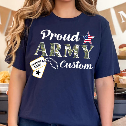 May include: Navy blue t-shirt with the words "Proud ARMY Custom" in white and camouflage lettering. An American flag star graphic and a dog tag design with the text "CUSTOM NAME" are also featured.