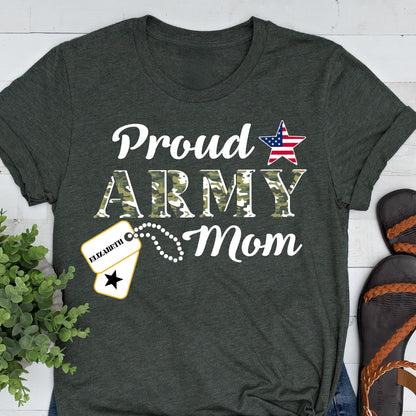 May include: Dark gray t-shirt with the words "Proud ARMY Mom" in white. The word "ARMY" is in a camouflage pattern. A star with the American flag design is above the word "ARMY". A dog tag with the name "Elizabeth" is also featured.