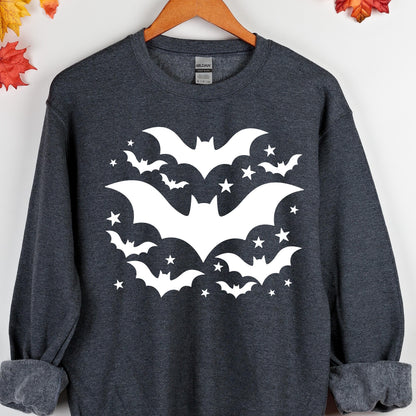 May include: Dark gray sweatshirt with a white bat and star design. The graphic features several bats of varying sizes and stars arranged in a circular pattern. The sweatshirt has a crew neck and long sleeves.