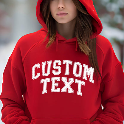 May include: Red hooded sweatshirt with white text that says "CUSTOM TEXT" in a varsity style font.