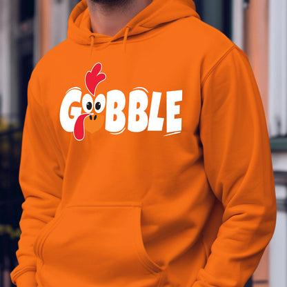 May include: Orange hoodie with a white graphic of a turkey head and the word "GOBBLE".