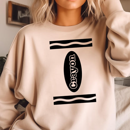 May include: A beige sweatshirt with a black and white graphic of a crayon. The graphic says "Crayon" in a black oval.