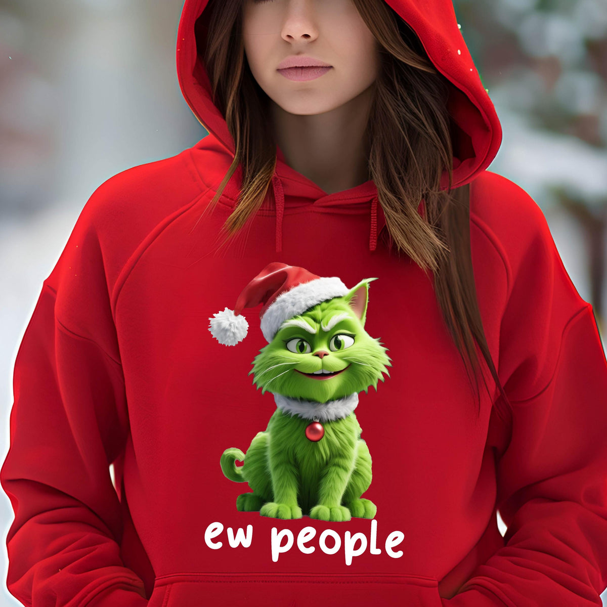 May include: Red hooded sweatshirt featuring a green cat wearing a Santa hat and a white collar. The cat has a grumpy expression. The text "ew people" is printed in white below the cat.