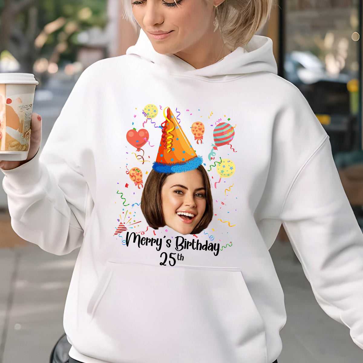 May include: White hoodie with a colorful birthday design featuring a person's face with a party hat and confetti. The text "Merry's Birthday 25th" is printed on the hoodie.