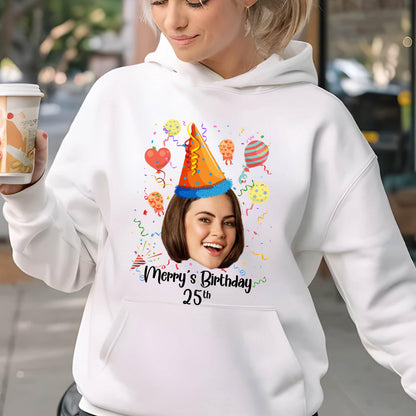 May include: White hoodie with a colorful birthday design featuring a person's face with a party hat and confetti. The text "Merry's Birthday 25th" is printed on the hoodie.