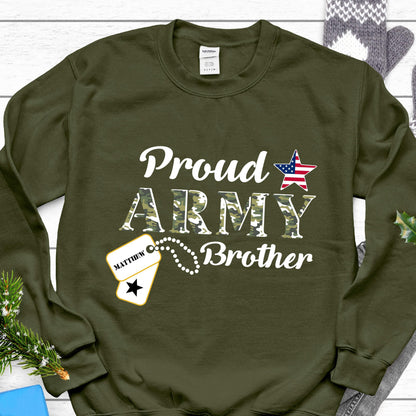 May include: An olive green sweatshirt with the words "Proud ARMY Brother" in white. The word "ARMY" is in a camouflage pattern. An American flag star graphic and a dog tag with the name "Matthew" are also featured.