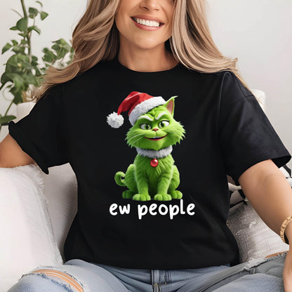 May include: A black short-sleeved t-shirt featuring a graphic of a green cat wearing a red and white Santa hat and a red bell collar. Below the cat, the text "ew people" is printed in white, rounded, lowercase letters on the front of the shirt.