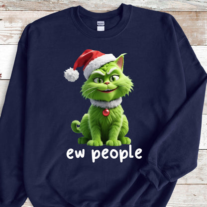 May include: Navy blue sweatshirt featuring a green cartoon cat wearing a Santa hat and a white collar with a red ornament. The text "ew people" is printed in white below the cat. The sweatshirt is a festive holiday item.