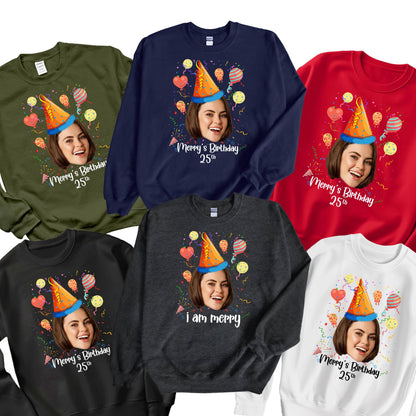 May include: Seven different color sweatshirts with a birthday party theme. Each sweatshirt features a person's face with a party hat and confetti. The text on the sweatshirts says "Merry's Birthday 25th" and "I am merry".