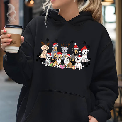 May include: Black hoodie featuring a festive graphic of various dog breeds wearing Santa hats and reindeer antlers. The dogs are arranged in a row with snowflakes and gifts, creating a holiday theme. The hoodie has a drawstring hood and a kangaroo pocket.