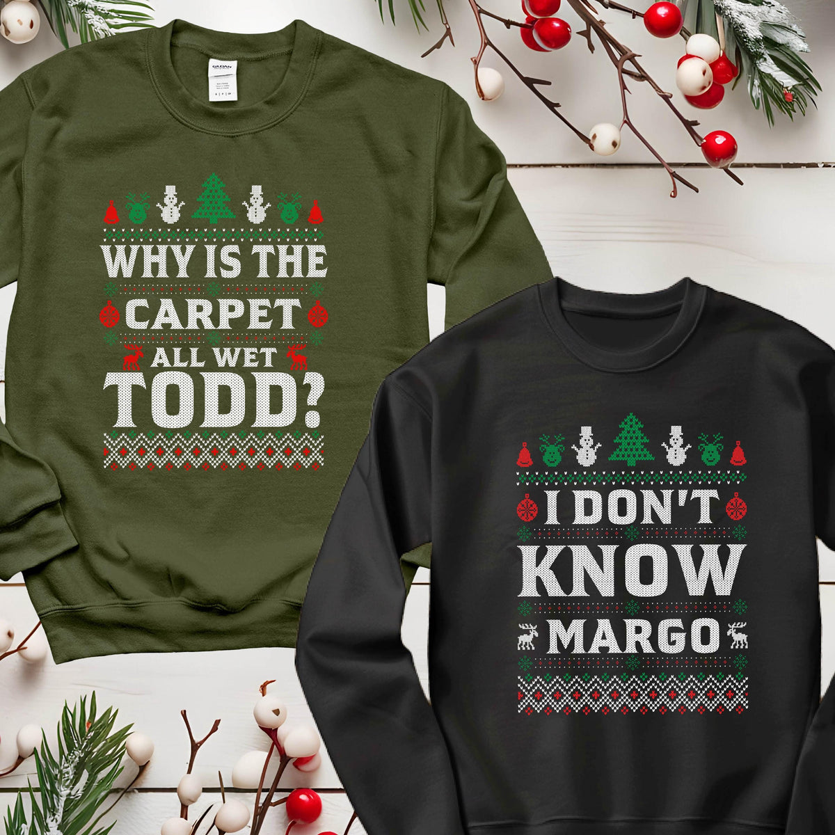 May include: Two Christmas sweaters with a green and black background. The green sweater has white text that says "Why is the carpet all wet Todd?" The black sweater has white text that says "I don't know Margo".
