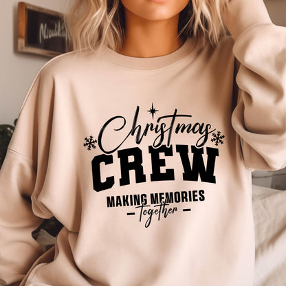 May include: A beige crewneck sweatshirt featuring black text that reads Christmas CREW MAKING MEMORIES Together, accented with small black snowflake and star icons. The design is centered on the front of the long-sleeved pullover garment.