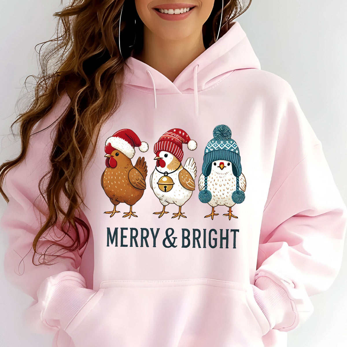 May include: Pink hoodie with a graphic of three chickens wearing Christmas hats and the text "Merry & Bright".