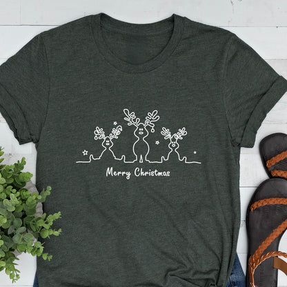 May include: Dark gray t-shirt featuring a white line drawing of three reindeer with star accents and the text "Merry Christmas". The reindeer have large antlers and are standing on a wavy line.