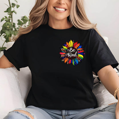 May include: Black t-shirt with a colorful sunflower design and the text "Be Kind" in white.
