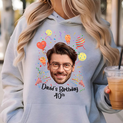 May include: A gray hoodie with a colorful birthday design featuring a person's face, balloons, confetti, and the text "David's Birthday 40th".