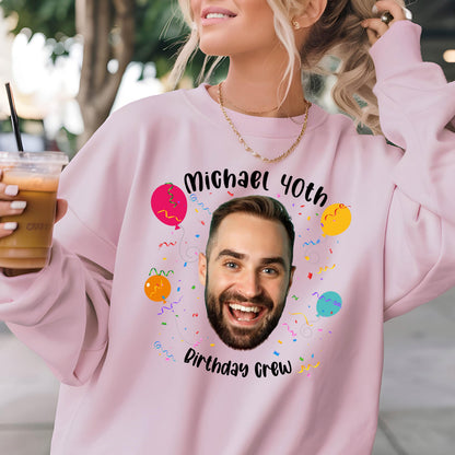 May include: Pink sweatshirt with a birthday design featuring a man's face, balloons, confetti, and the text "Michael 40th Birthday Crew".