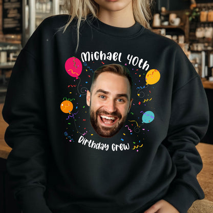 May include: Black sweatshirt with a colorful birthday design. The design features a person's face, balloons, confetti, and the text "Michael 40th Birthday Crew".