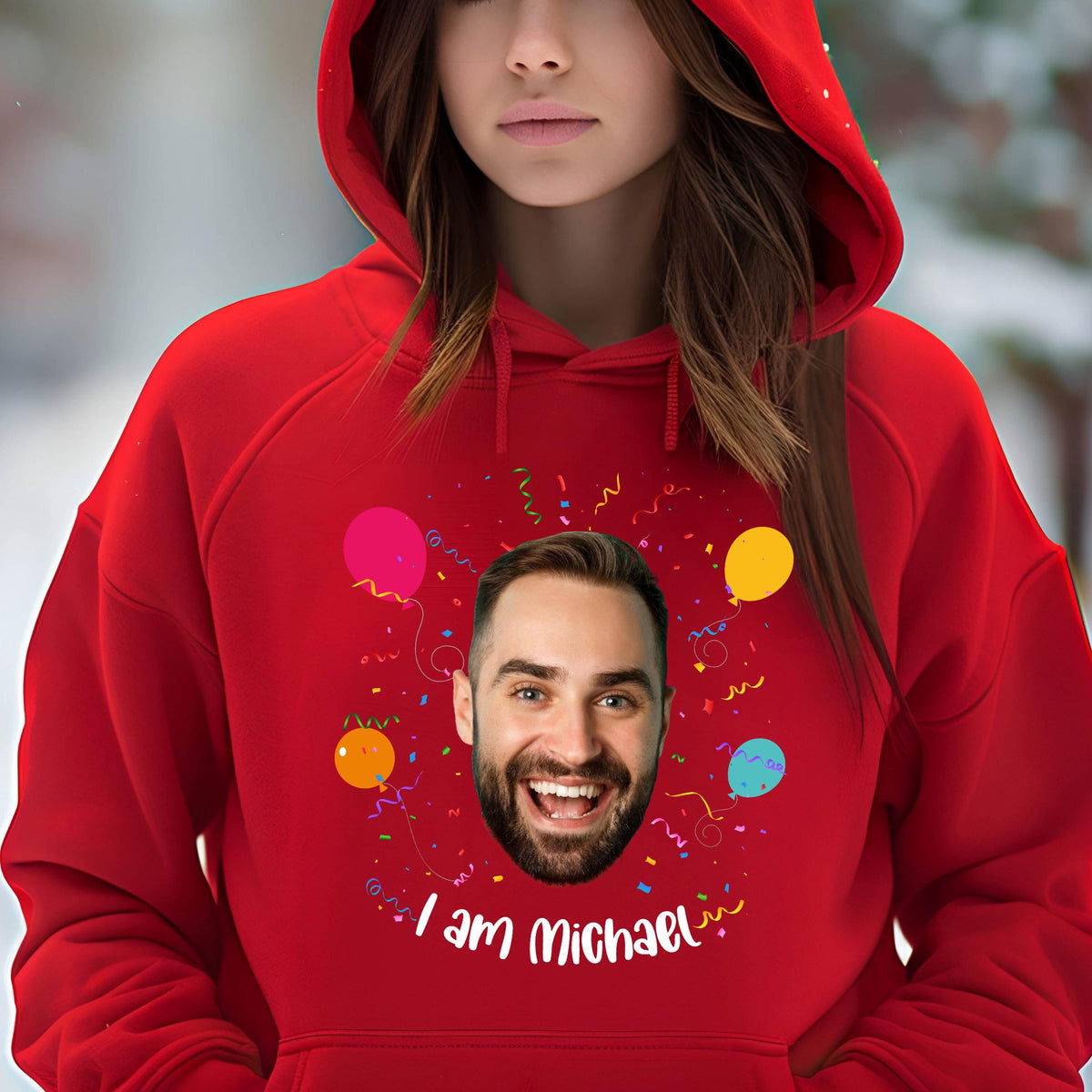 May include: Red hoodie with a personalized design featuring a man's face, colorful balloons, confetti, and the text "I am Michael".