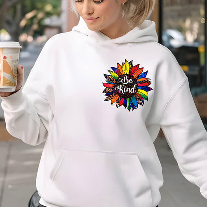 May include: White hoodie with a rainbow sunflower graphic and the text "Be Kind" in the center.