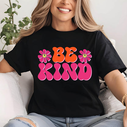 May include: Black t-shirt with a pink and orange graphic that says "BE KIND" with two pink flowers with yellow smiley faces on the sides.