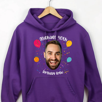 May include: Purple hoodie with a personalized birthday design. The design features a person's face, balloons, confetti, and the text "Michael 40th Birthday Crew".