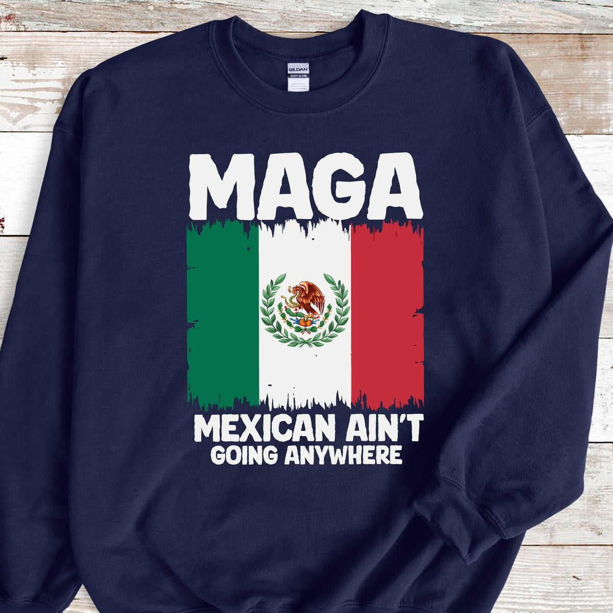 May include: Navy blue sweatshirt with a white graphic of the Mexican flag and the text "Maga Mexican Ain't Going Anywhere".