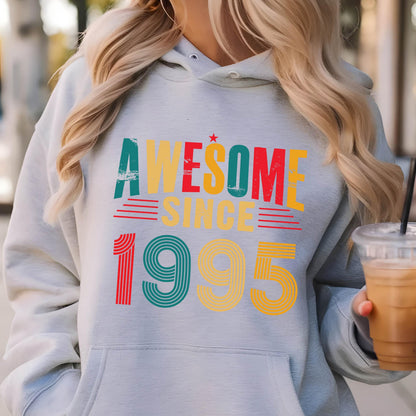 May include: Gray hooded sweatshirt with the text "AWESOME SINCE 1995" in colorful retro-style lettering.