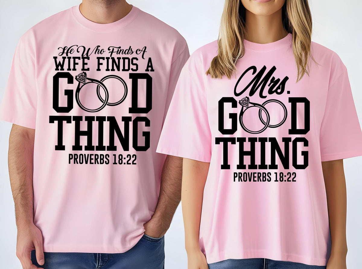 May include: Two light pink t-shirts with black text and ring graphics. One shirt reads "He Who Finds A Wife Finds A Good Thing Proverbs 18:22." The other reads "Mrs. Good Thing Proverbs 18:22."