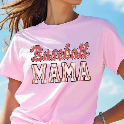 May include: Pink t-shirt with the text "Baseball Mama" in red and white lettering. The word "Mama" is surrounded by a baseball stitch design.