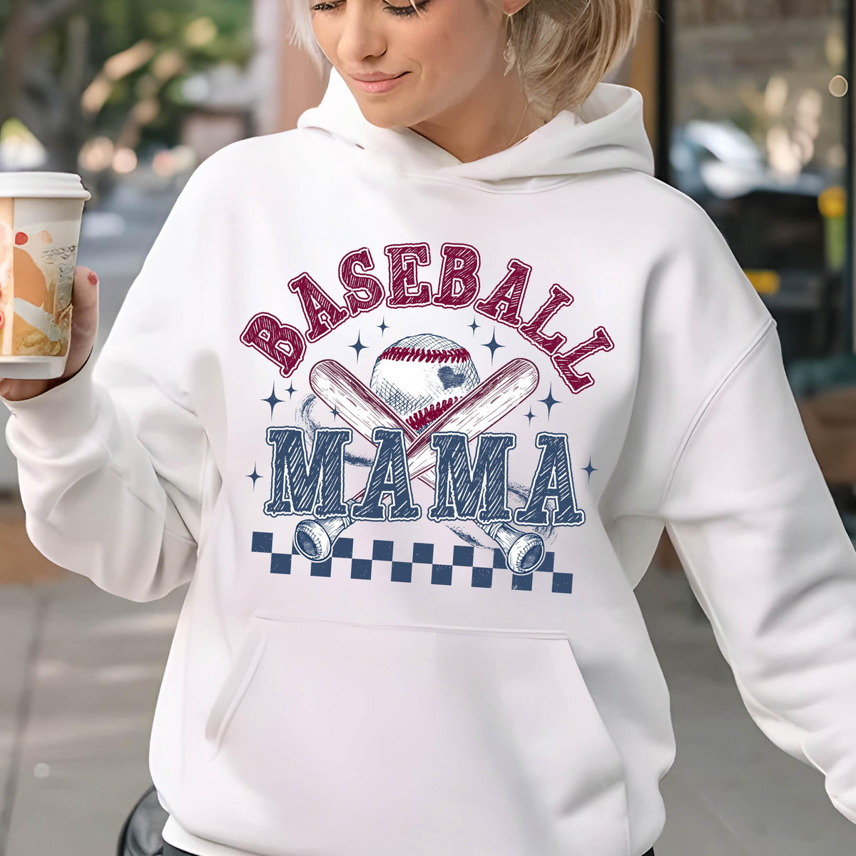 May include: White hoodie with a red and blue graphic design that says "Baseball Mama" with a baseball and crossed bats.