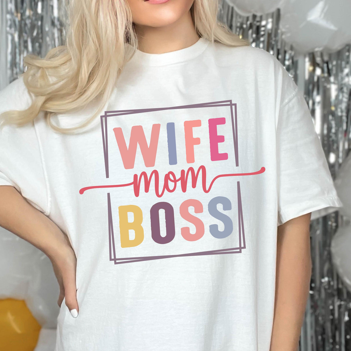 May include: White t-shirt with the text "Wife Mom Boss" in a colorful box.
