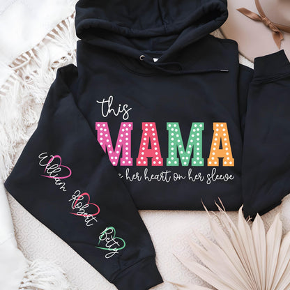 May include: Black hooded sweatshirt with the text "This Mama - her heart on her sleeve" in colorful polka dot letters. The sleeve has the names "William, Robert, Betty" written in a heart shape.